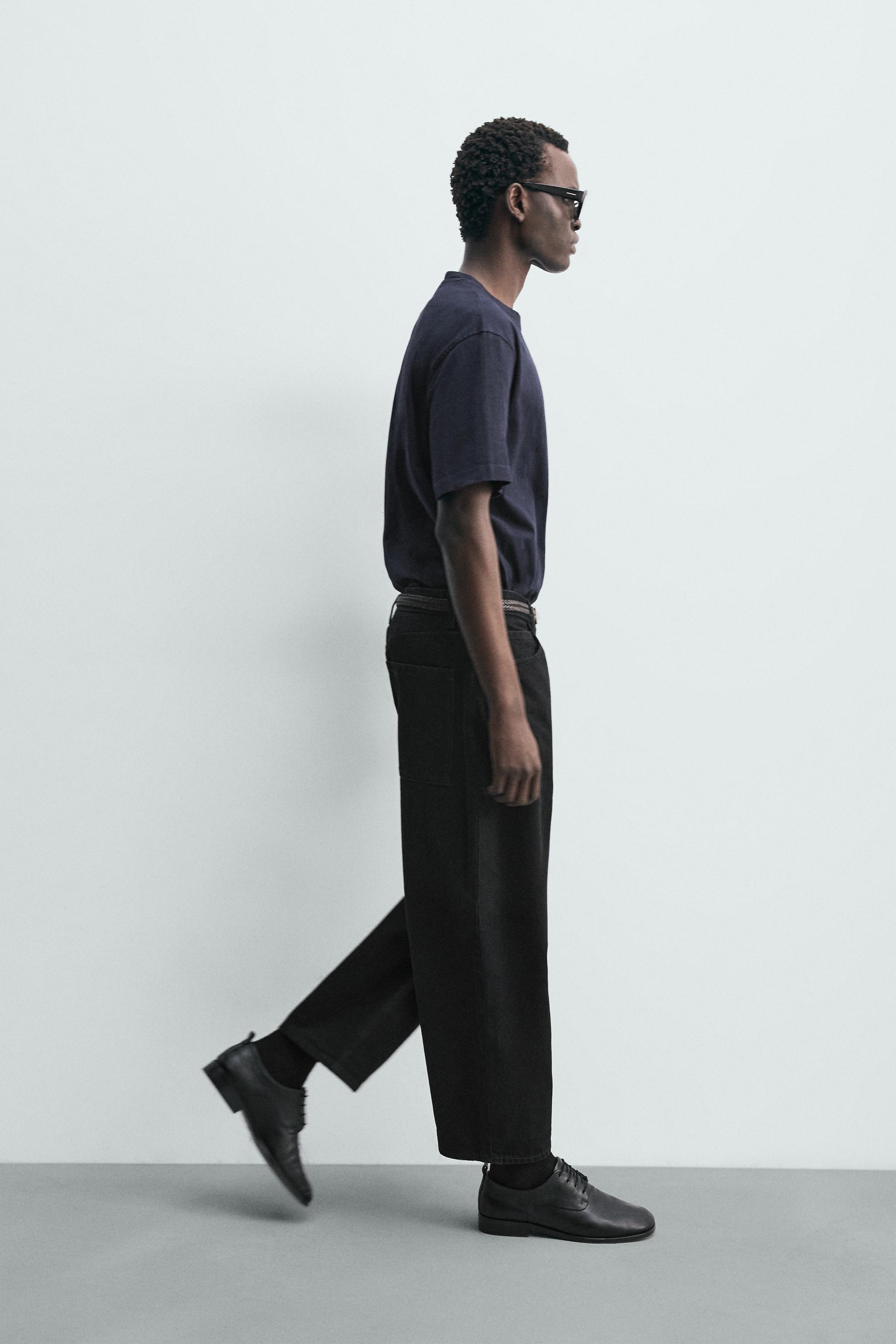 TAPERED WIDE FIT JEANS